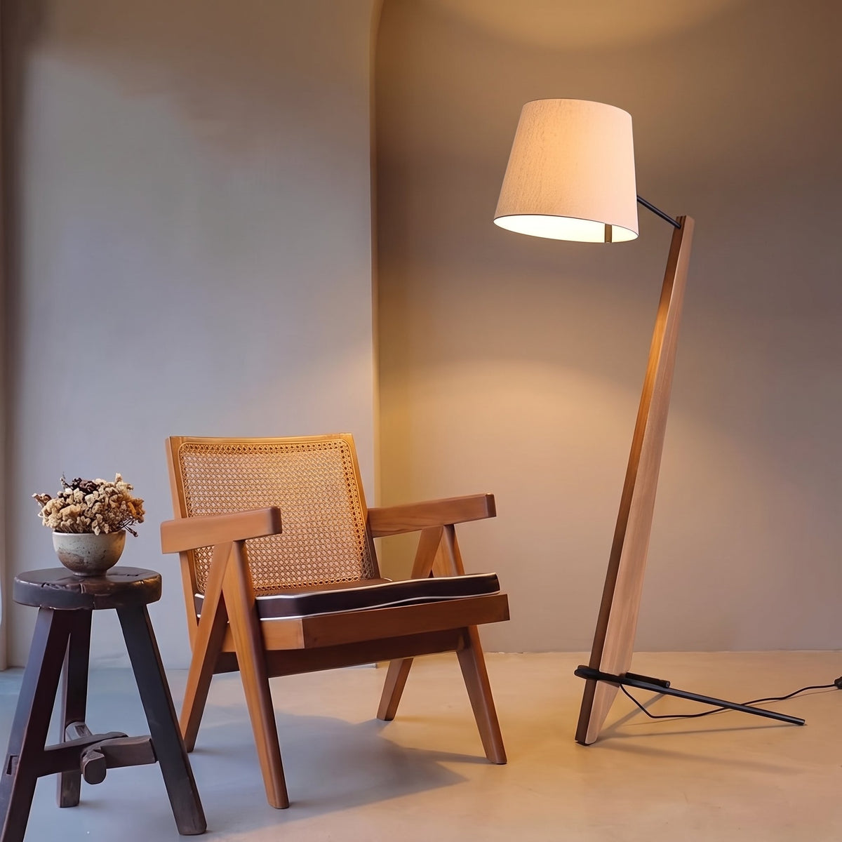 Timber Tilt Floor Lamp — living room with cane accent chair