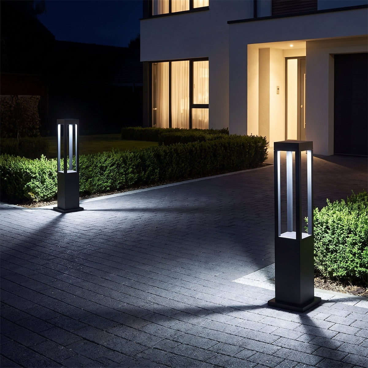 Rowan Aluminum Bollard Light — lifestyle, cool white driveway at night