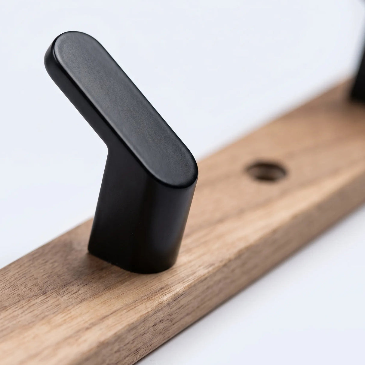 Upward-Curving Pegs Coat Rack — peg close-up