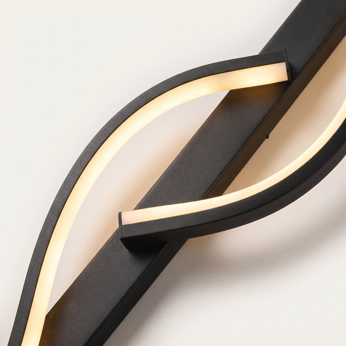 Halo Bar Wall Sconce — detail, wavy light ribbon close-up