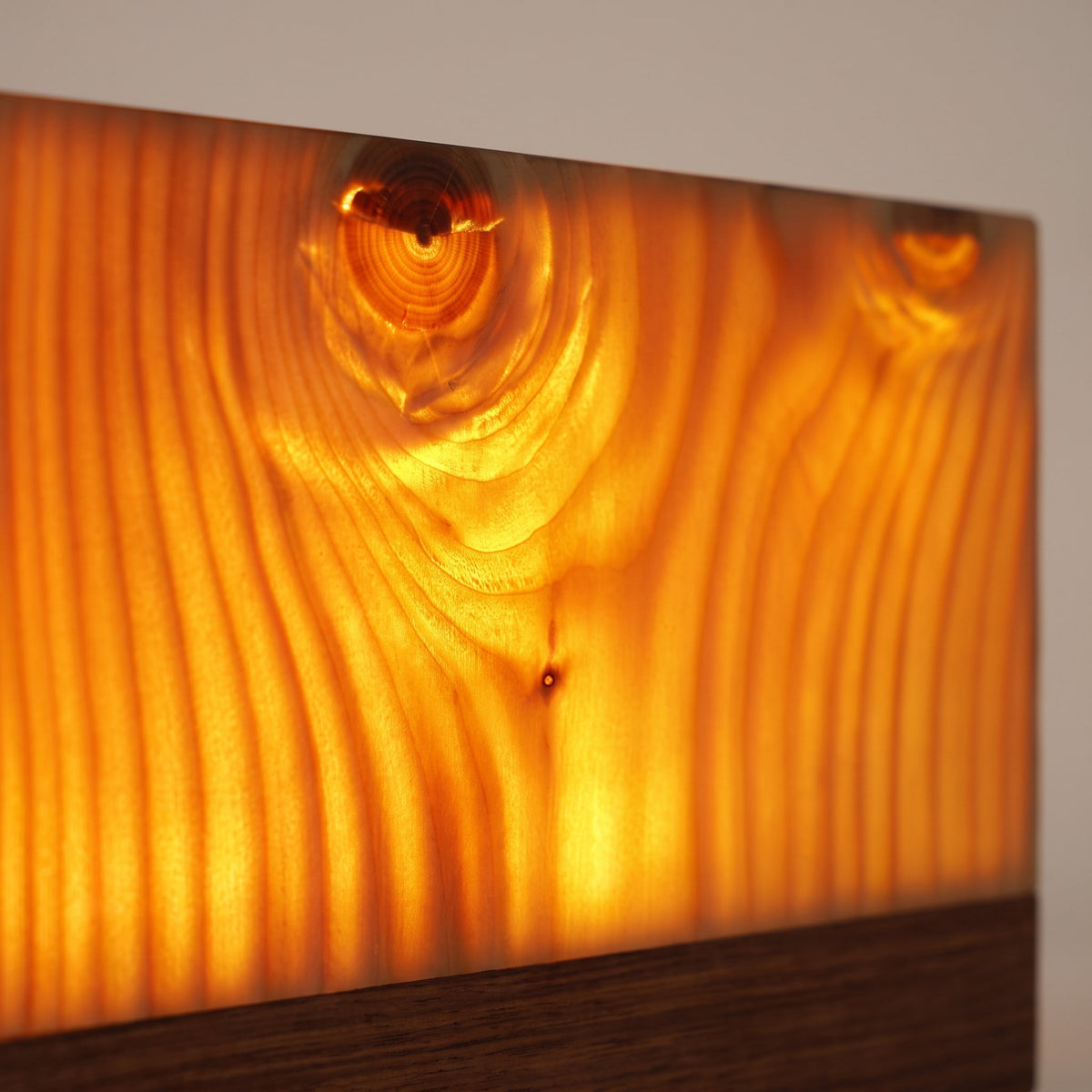 Grove Cube Lamp — illuminated wood grain detail