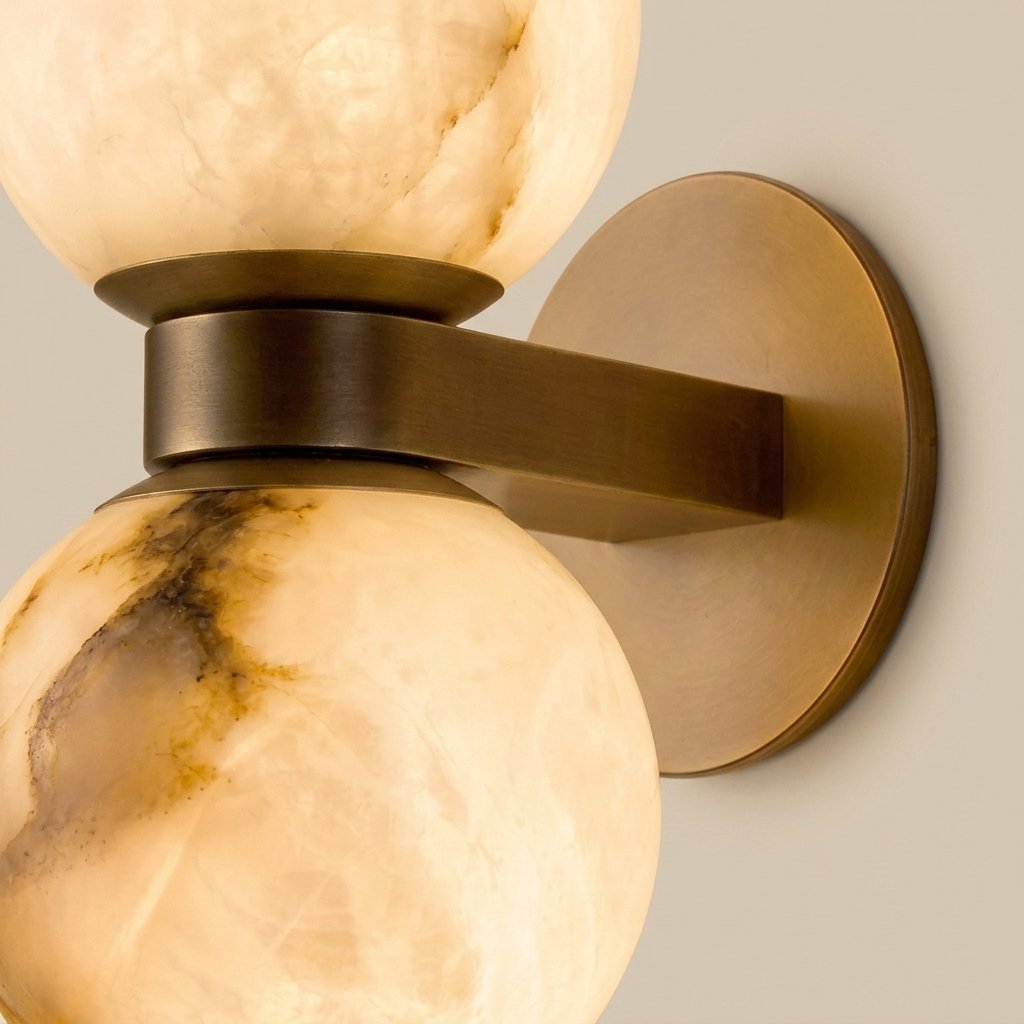 Lunara Marble Wall Lamp — marble globe and bronze arm detail