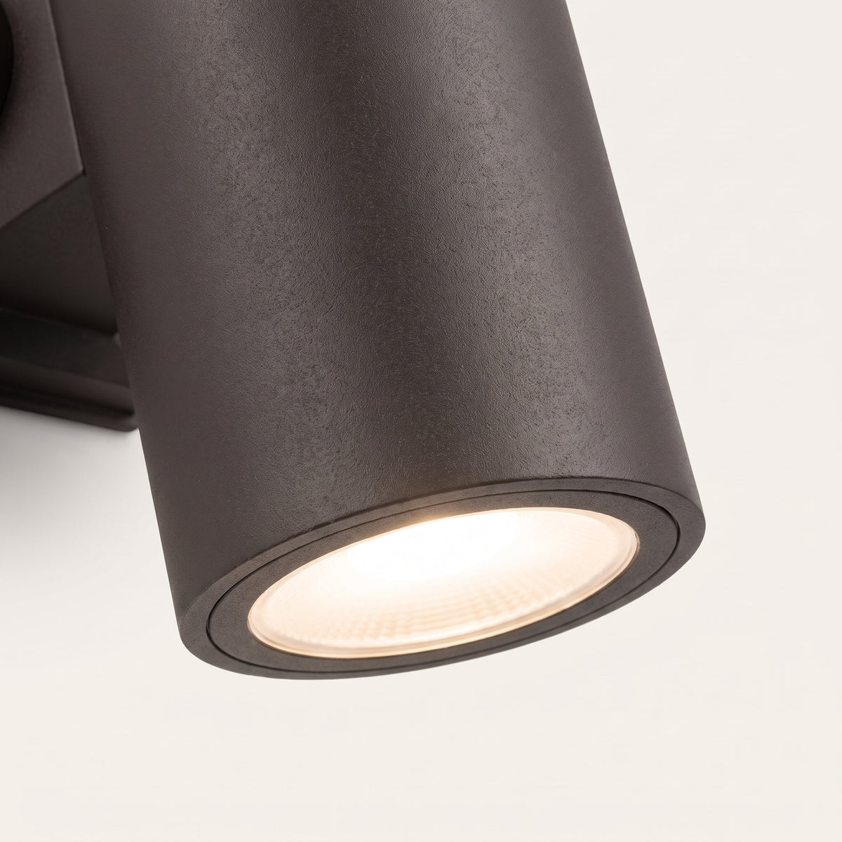 Bastion Cylinder Wall Light — lens and housing detail