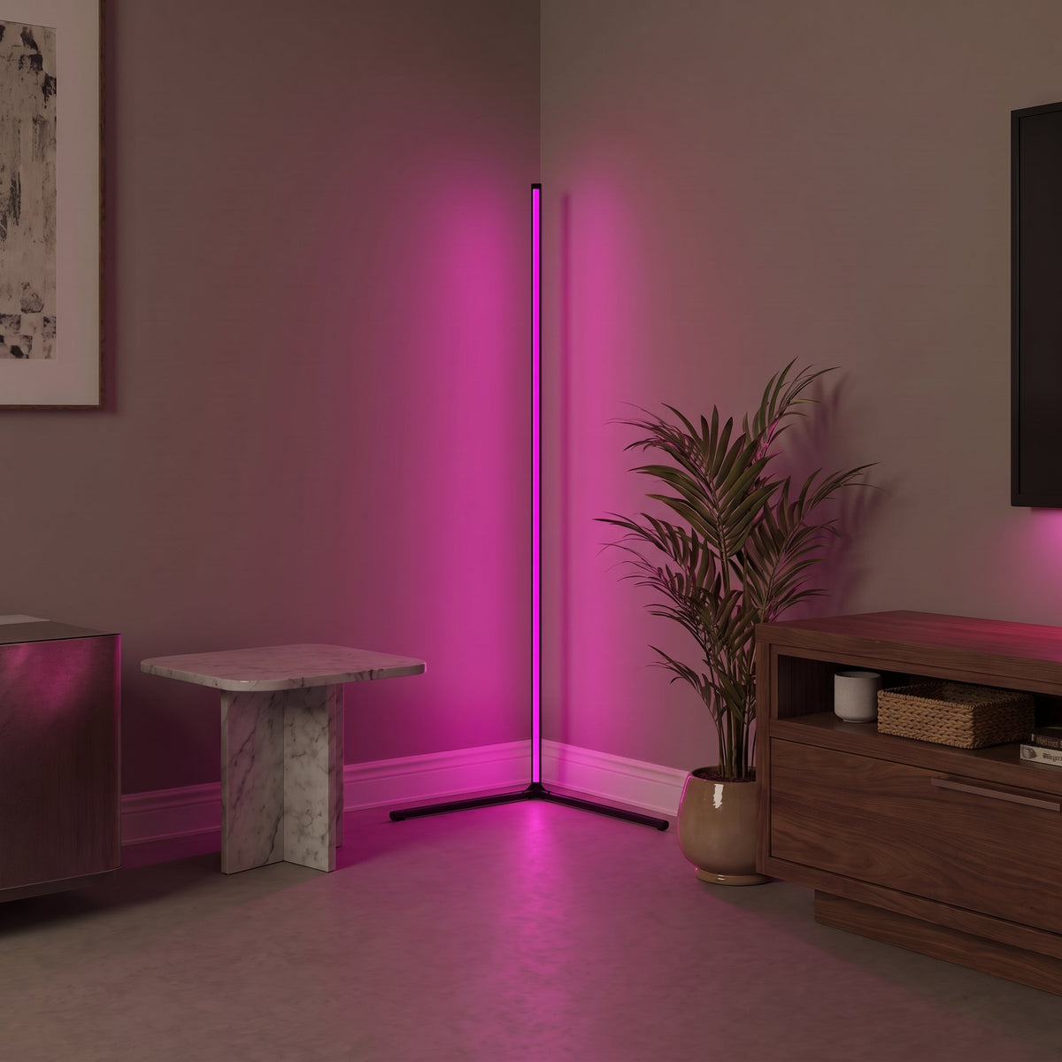 Pulse RGB Floor Lamp — magenta glow in living room with plant