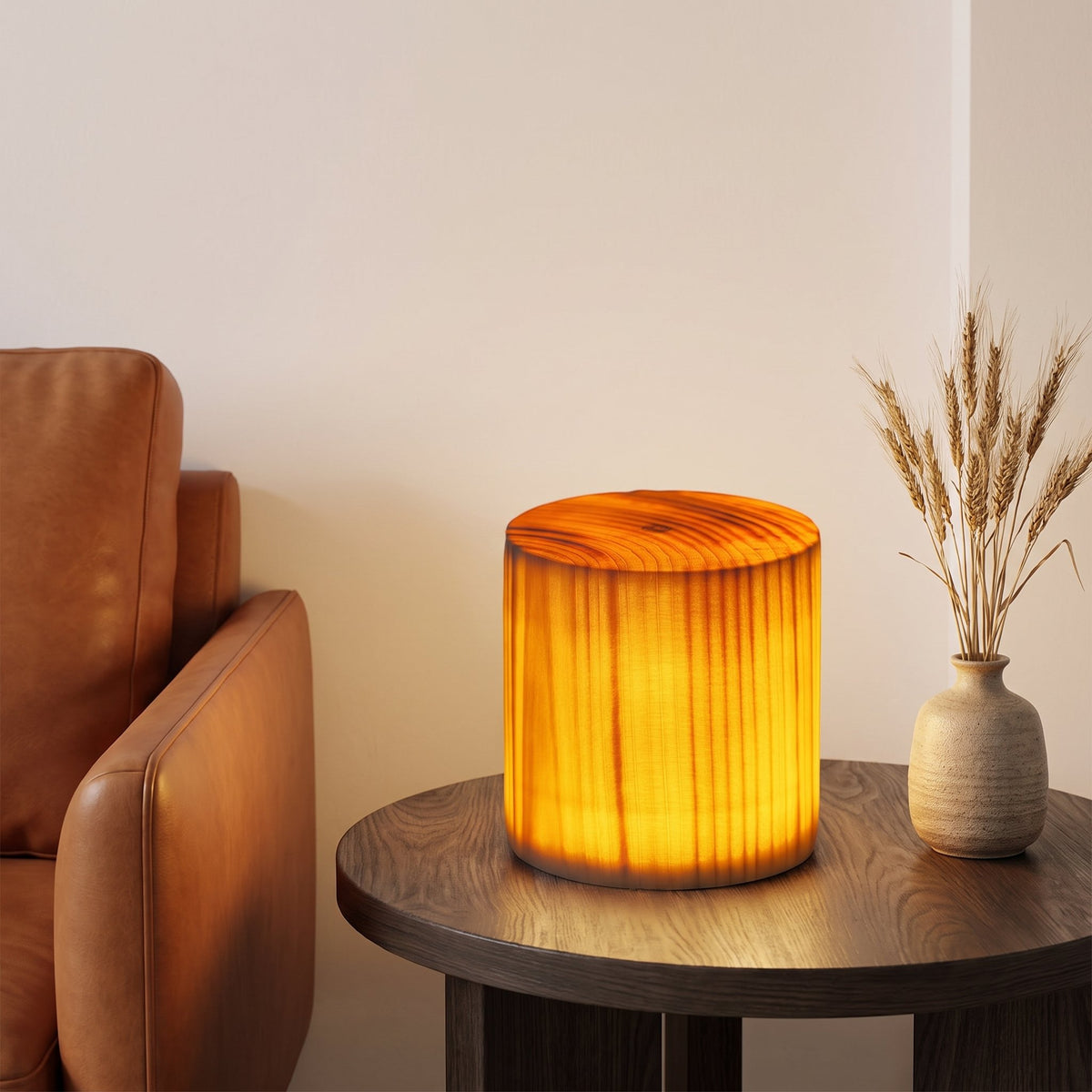 Grove Cube Lamp — cylinder on oak side table beside leather armchair