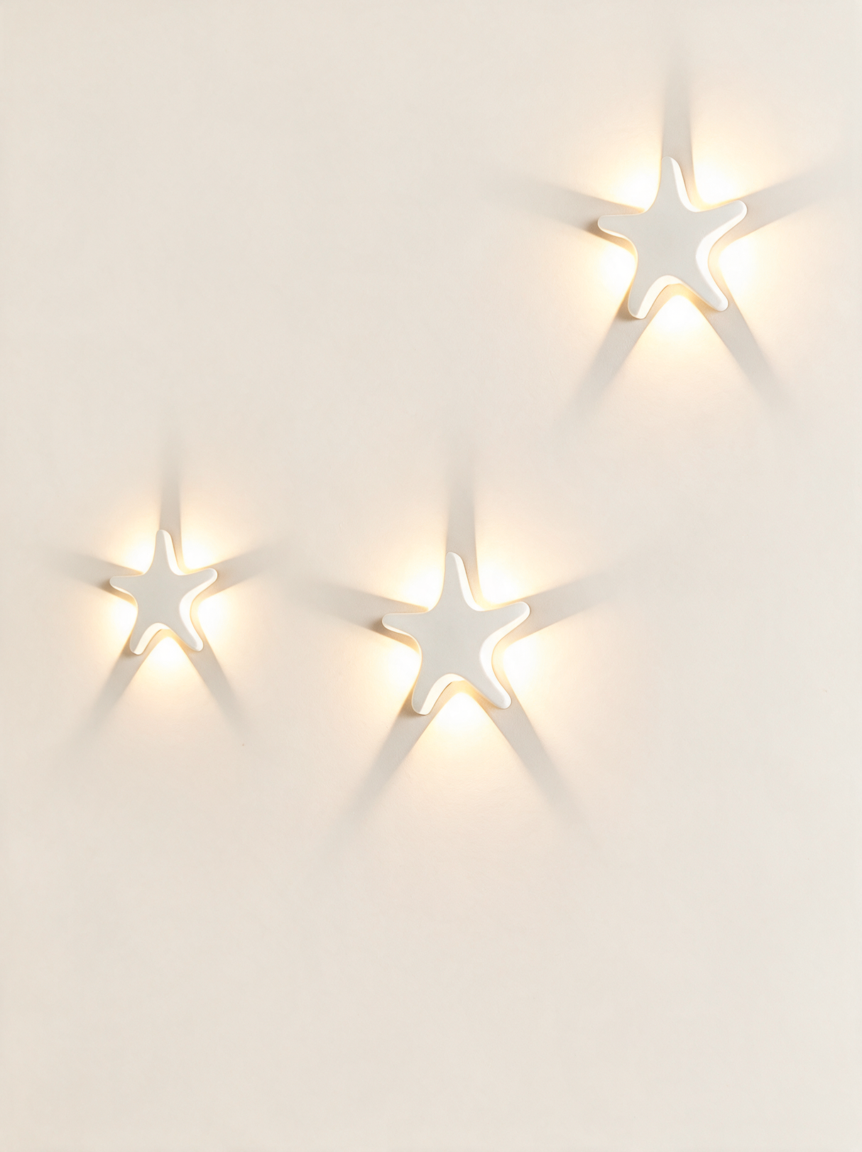 Aurelia Silhouette Wall Sconce - hero product shot (starfish, white)