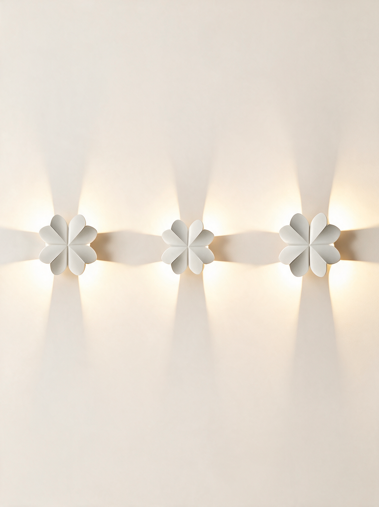 Aurelia Silhouette Wall Sconce - hero product shot (four-leaf clover, white)