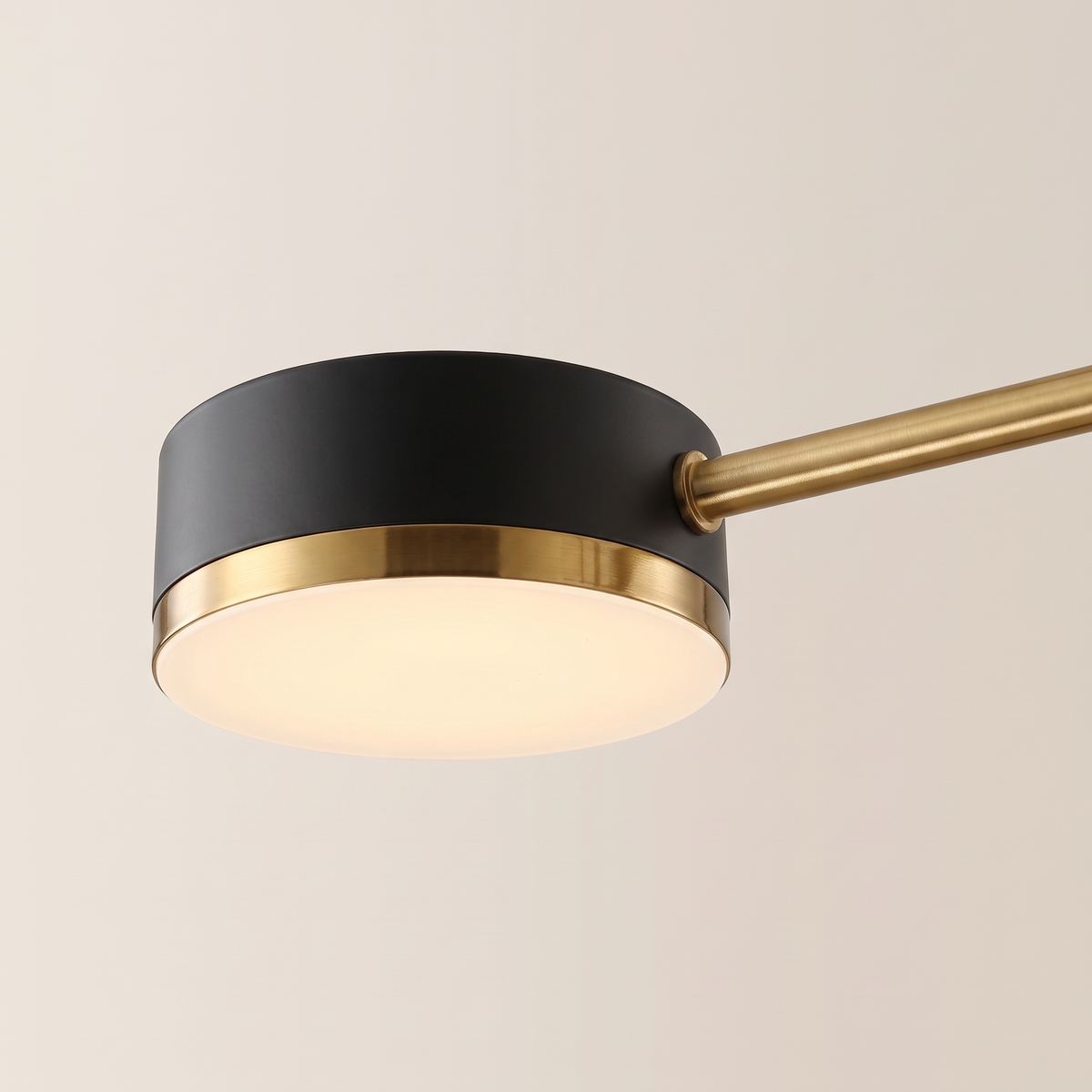 Pylon Arm Chandelier black and gold cylinder head and arm detail