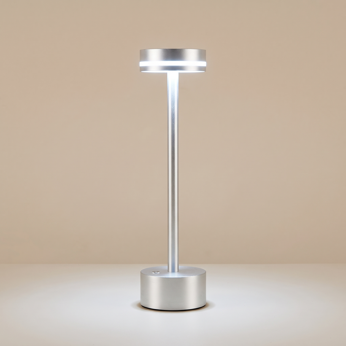 Drift Aluminum Table Lamp — Silver, switched on