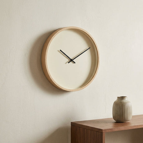 Clocks & Wall Art collection — wall clock above a console