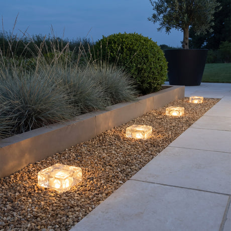 Glacier Solar Paver Light — garden path at dusk
