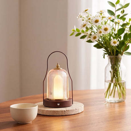 Ember Brass Lantern Lamp — Birdcage, lifestyle on wood table with daisies