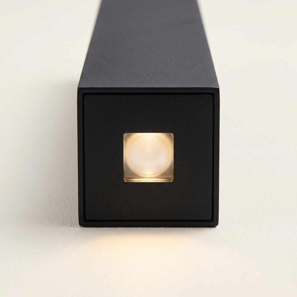 Slab Outdoor Wall Light close-up of the black end face with a small square light opening in the center