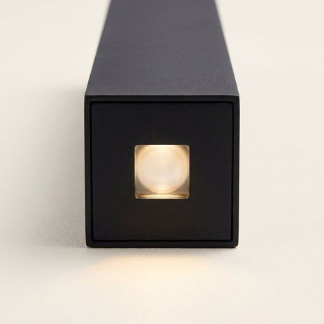 Slab Outdoor Wall Light close-up of the black end face with a small square light opening in the center