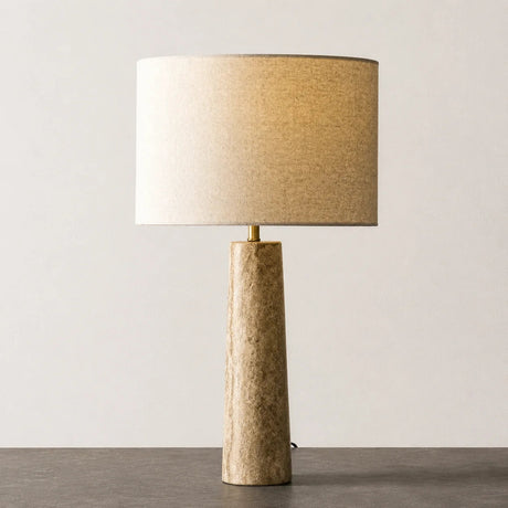 Cortona Travertine Table Lamp — tapered style in a living room