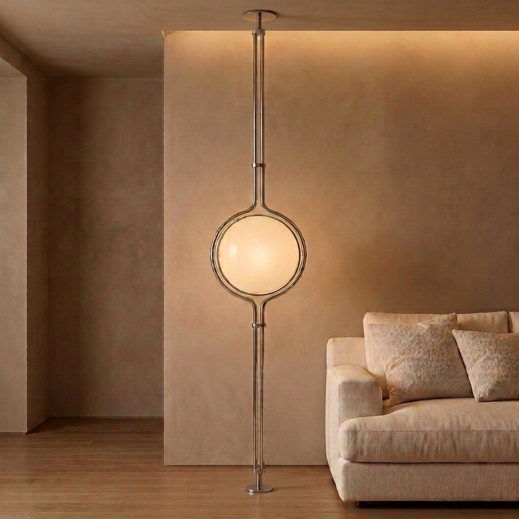 Chrome Globe Column Lamp — warm taupe living room with cream sofa