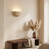 Lumo Travertine Wall Lamp — bedroom bench setting