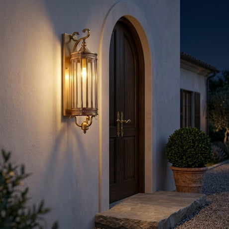 Corbel Wall Lantern — lit at night beside an entrance