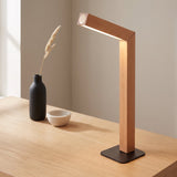 Linea Wood Strip Lamp — Wood on oak desk, lifestyle