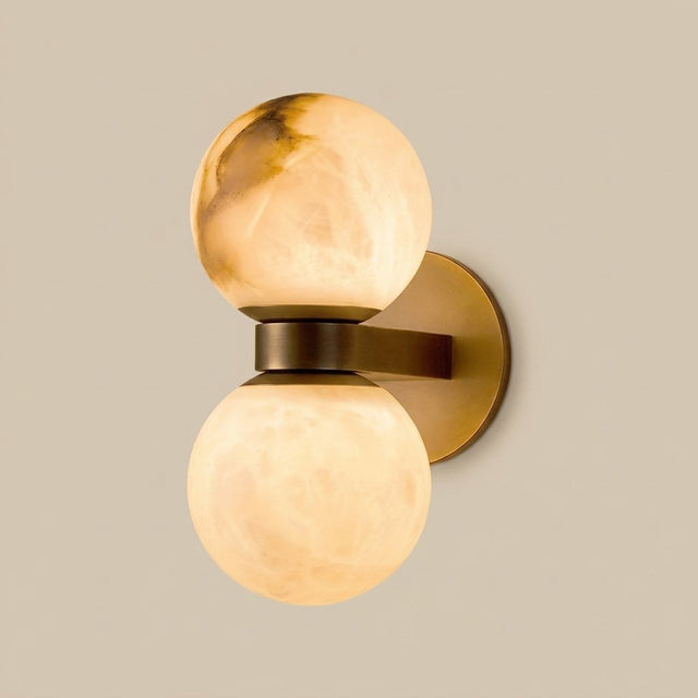 Lunara Marble Wall Lamp — studio hero, lit