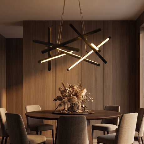 Tangent Bar Chandelier — lit above a dining table at dusk