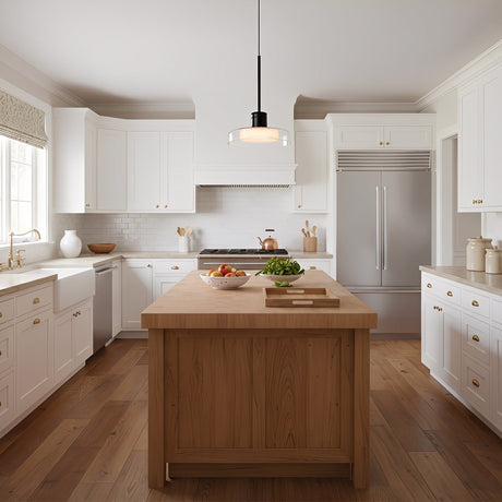 Puck Glass Pendant — clear glass in a bright kitchen
