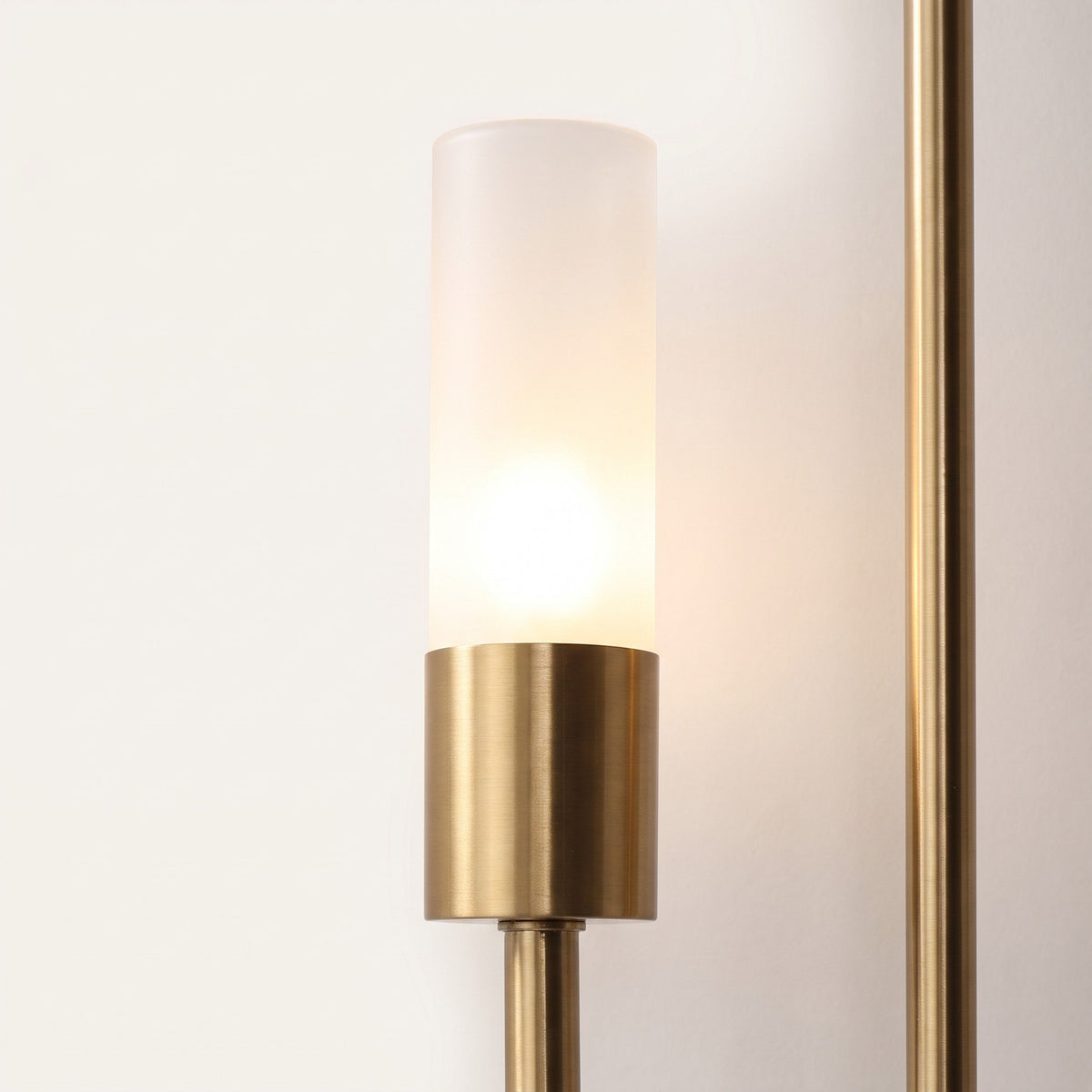 Dual Glow Wall Sconce - close-up detail of frosted capsule shade and bulb holder