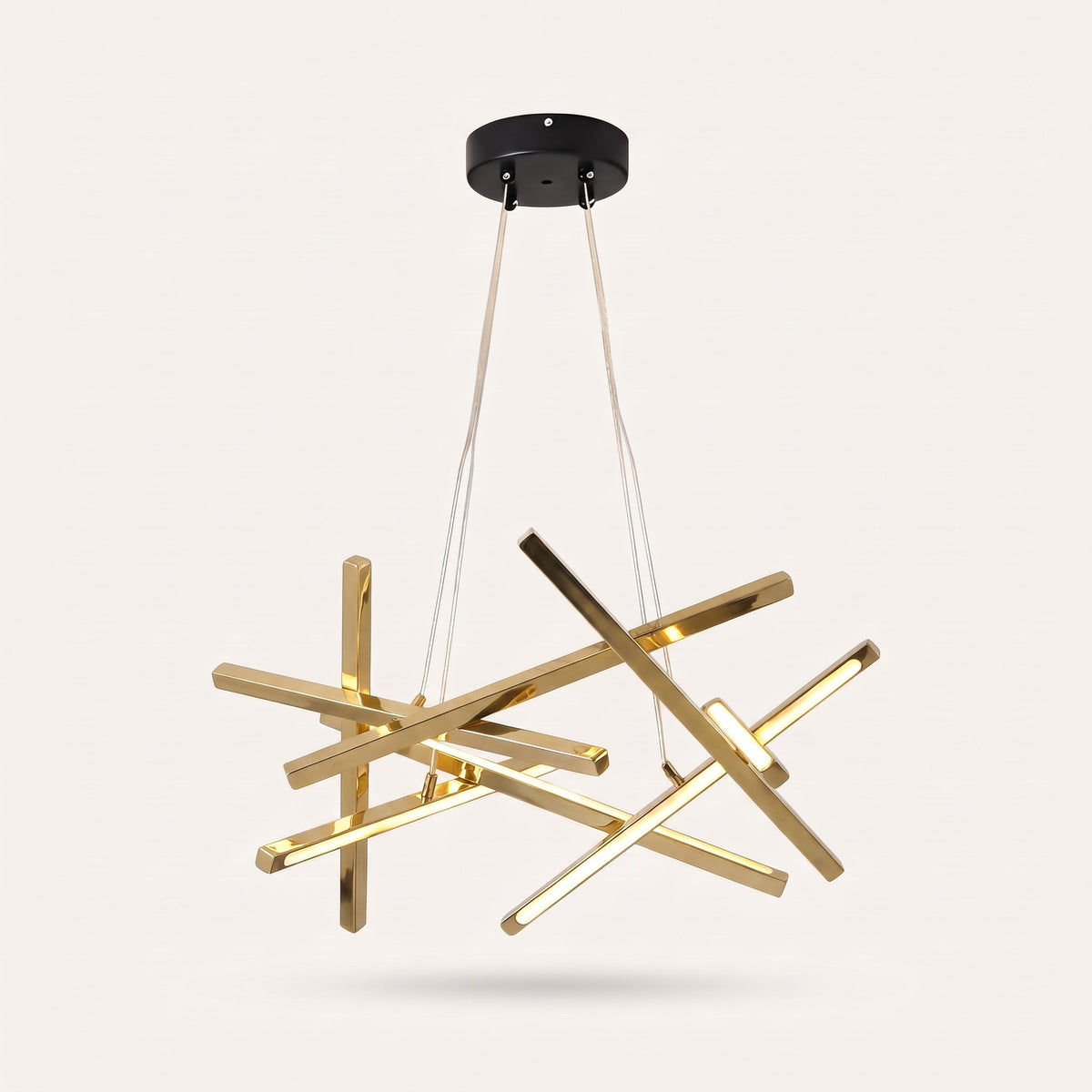 Tangent Bar Chandelier — gold crisscross bars, studio view