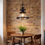 Foundry Glass Pendant — over a dining nook by a brick wall