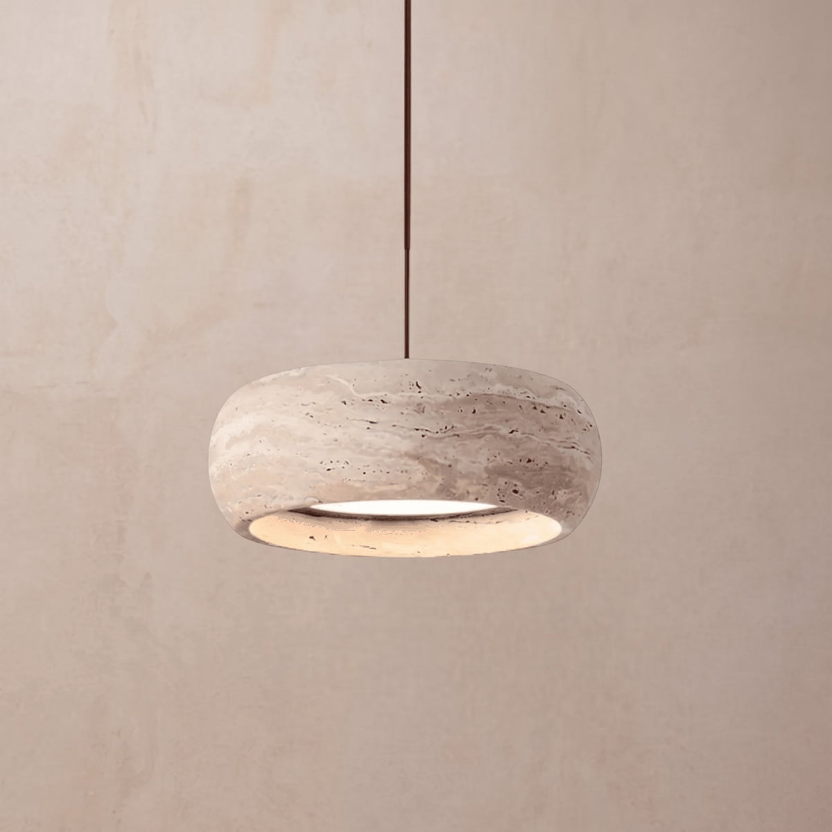 Ithaca Travertine Pendant — beige wall lifestyle