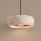 Ithaca Travertine Pendant — studio hero on taupe