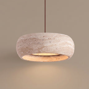 Ithaca Travertine Pendant — studio hero on taupe