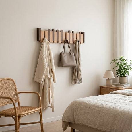 Orlo Piano Key Coat Rack — in a bedroom holding a robe, handbag and scarf