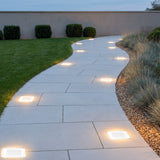Glacier Solar Paver Light — walkway at dusk