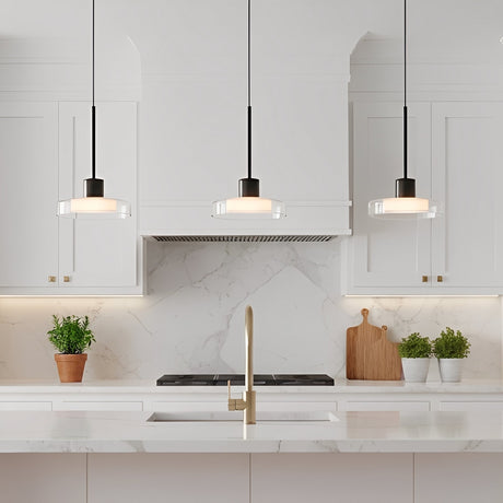 Puck Glass Pendant — three pendants above a marble backsplash