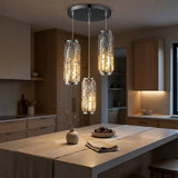 Prism Mini Pendant — chrome 3-Light cluster at dusk over stone island