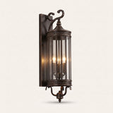 Corbel Wall Lantern — three-bulb antique bronze wall lantern with clear glass