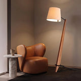 Timber Tilt Floor Lamp — living room with cognac leather chair