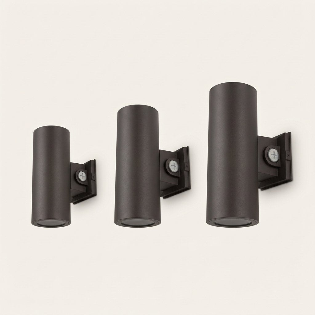 Bastion Cylinder Wall Light — three sizes side by side