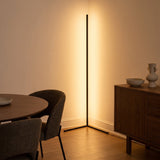 Pulse RGB Floor Lamp — warm amber corner light in dining nook