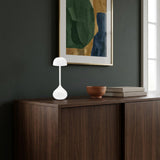 Droplet Cordless Table Lamp — Glossy White in a living space