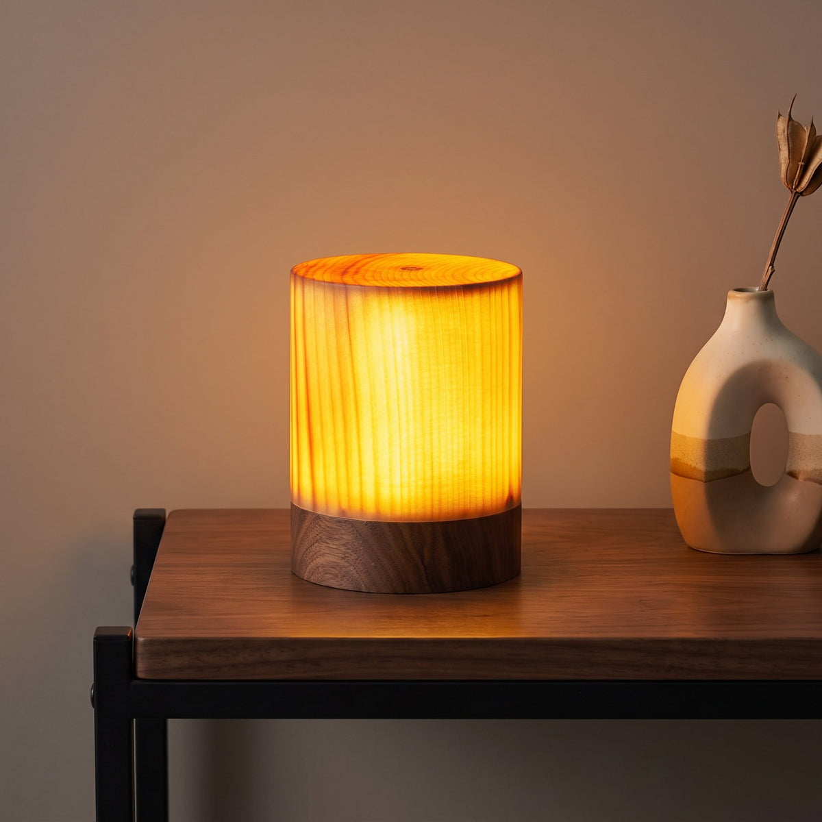 Grove Cube Lamp — cylinder with dark base on side table