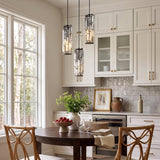 Prism Mini Pendant — black pendants over round dining table