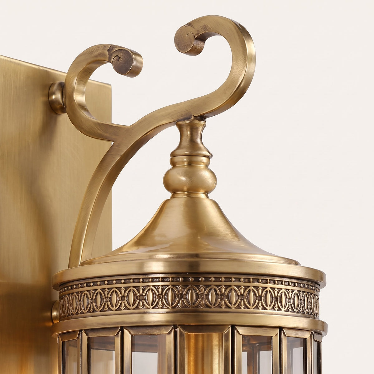 Corbel Wall Lantern — close-up of the scrollwork bracket and decorative band