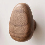 Rondis Pebble Wall Hangers — wood grain detail