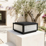 Sillar Ribbed Pillar Light — 19.7'' on a villa gate pier, daytime