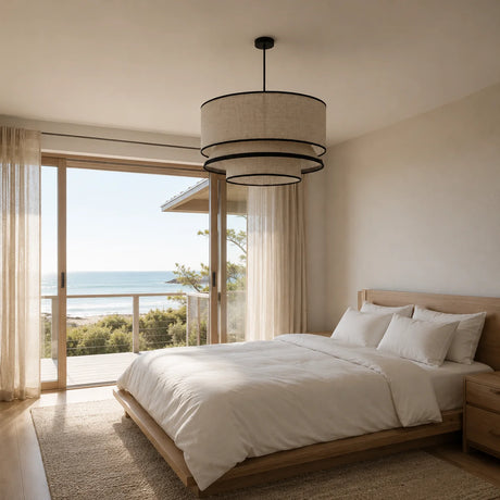 Sable tiered fabric pendant in a bedroom with an ocean view