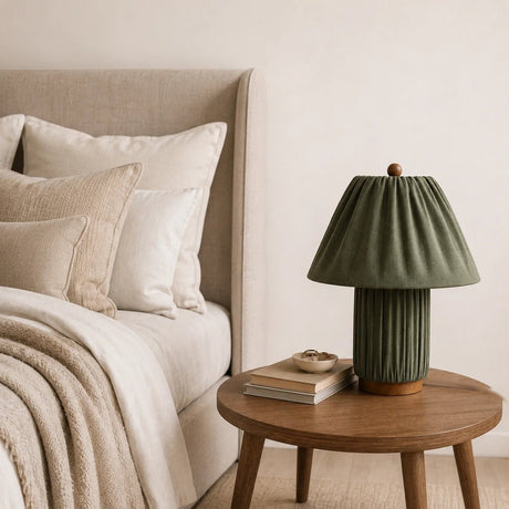 Plisse Fabric Table Lamp — Green, on a bedside table