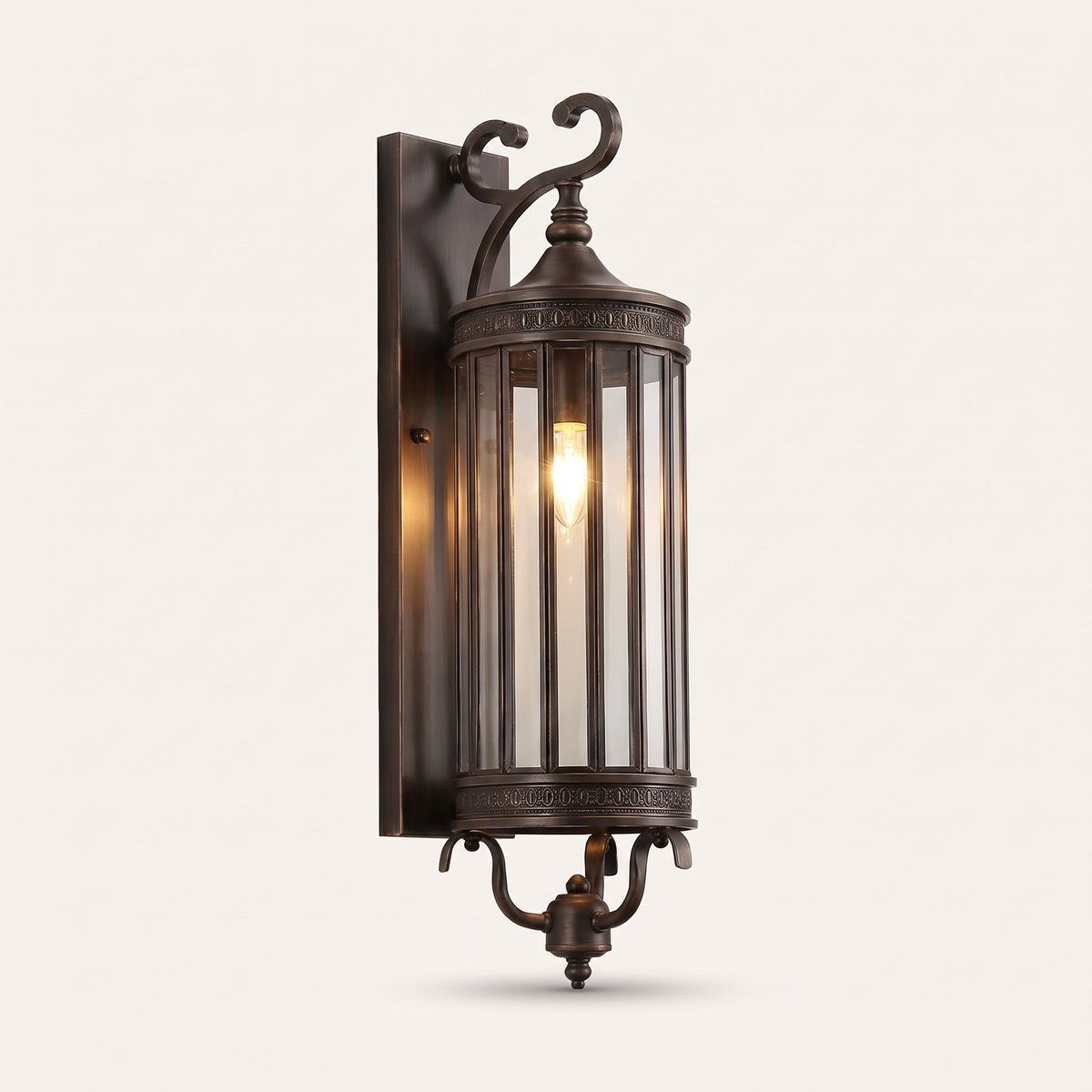 Corbel Wall Lantern — single-bulb antique bronze wall lantern with clear glass