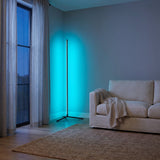 Pulse RGB Floor Lamp — cyan glow in living room at dusk